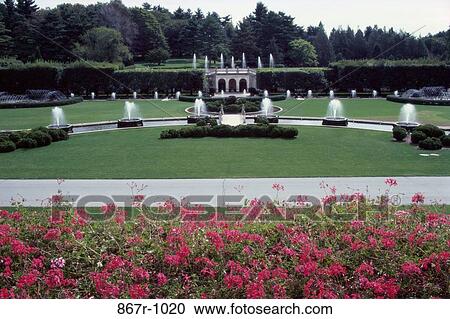 Water fountains in a garden View Large Photo Image Stock Image - Water fountains in a garden. Fotosearch
