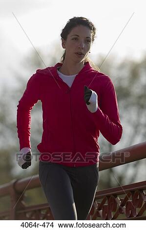 Woman jogging View Large Photo Image Picture - Woman jogging. Fotosearch