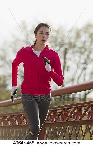 Stock Photo - Woman jogging. Fotosearch