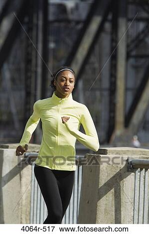 Woman jogging View Large Photo Image Stock Photo - Woman jogging. Fotosearch