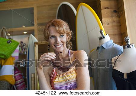 Woman shopping for sunglasses View Large Photo Image Stock Image - Woman shopping for sunglasses. Fotosearch