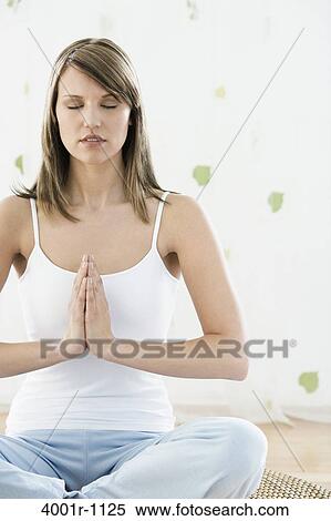 Woman sitting in yoga pose View Large Photo Image Stock Photography - Woman sitting in yoga pose. Fotosearch