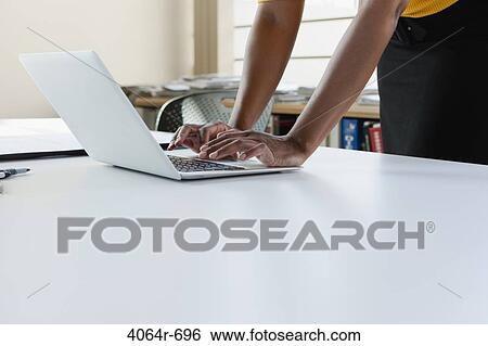 Woman's hands on computer View Large Photo Image Stock Photograph - Woman's hands on computer. Fotosearch