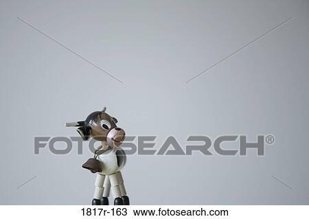 Wooden toy cow View Large Photo Image Stock Image - Wooden toy cow. Fotosearch