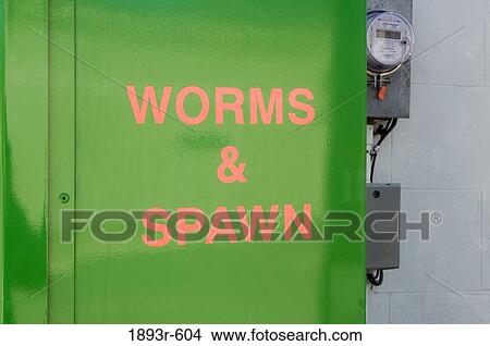 Picture - WORMS & SPAWN sign outside a store. Fotosearch