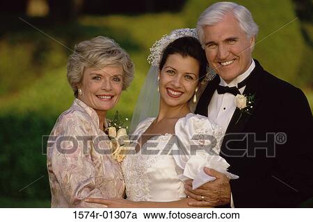 Bride with her father and mother View Large Photo Image Stock Image - Bride with her father and mother. Fotosearch