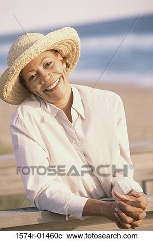 Stock Image - Portrait of a senior woman smiling. Fotosearch