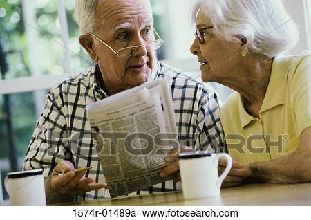 Senior couple looking at each other View Large Photo Image Stock Image - Senior couple looking at each other. Fotosearch