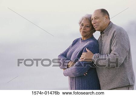 Senior couple standing together View Large Photo Image Stock Image - Senior couple standing together. Fotosearch