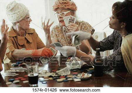 Stock Photograph - Three senior women playing cards. Fotosearch
