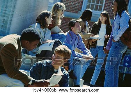 Group of young people with books View Large Photo Image Stock Image - Group of young people with books. Fotosearch