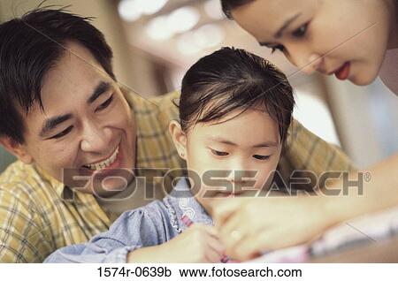 Mother and father with their son View Large Photo Image Stock Image - Mother and father with their son. Fotosearch