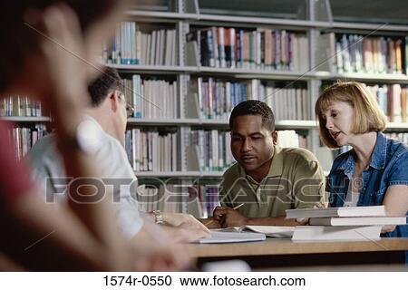 People at a library View Large Photo Image Stock Image - People at a library. Fotosearch