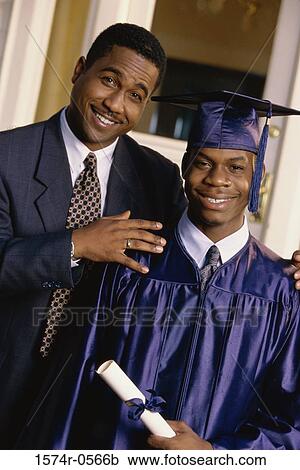 Portrait of a father with his graduate son View Large Photo Image Stock Image - Portrait of a father with his graduate son. Fotosearch