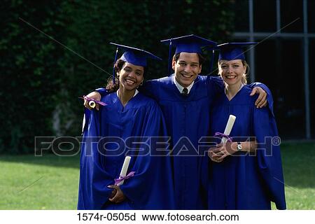 Stock Image - Portrait of a group of students wearing graduation outfits. Fotosearch
