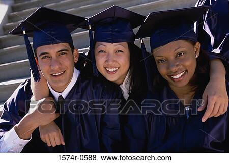 Stock Photo - Portrait of a group of students wearing graduation outfits. Fotosearch