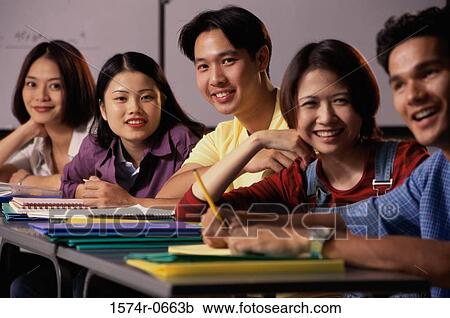 Portrait of a row of teenage students smiling in a class View Large Photo Image Stock Image - Portrait of a row of teenage students smiling in a class. Fotosearch