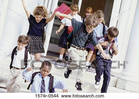 School children leaving the school building View Large Photo Image Picture - School children leaving the school building. Fotosearch