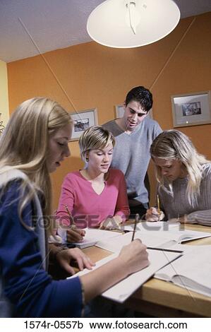 Teenagers studying together View Large Photo Image Stock Image - Teenagers studying together. Fotosearch