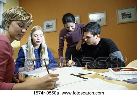 Teenagers studying together View Large Photo Image Stock Image - Teenagers studying together. Fotosearch