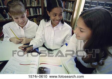 Three girls studying together View Large Photo Image Stock Image - Three girls studying together. Fotosearch