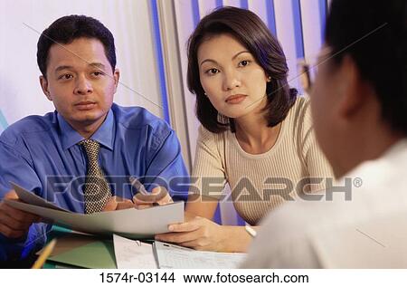 Business executives in a meeting View Large Photo Image Picture - Business executives in a meeting. Fotosearch