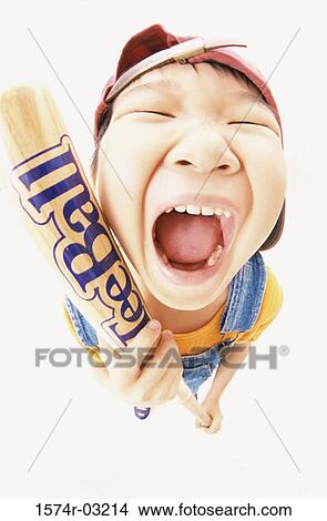 High angle view of a boy holding a baseball bat View Large Photo Image Picture - High angle view of a boy holding a baseball bat. Fotosearch