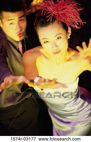 High angle view of a young couple dancing in a nightclub View Large Photo Image Stock Photo - High angle view of a young couple dancing in a nightclub. Fotosearch