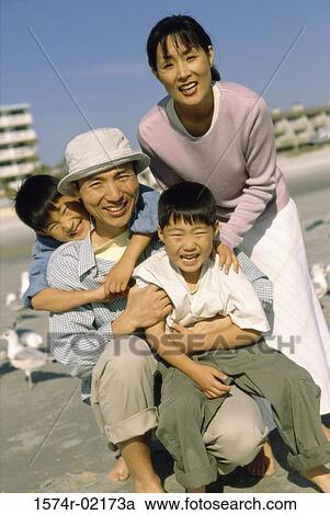 Portrait of parents with their son and daughter View Large Photo Image Stock Image - Portrait of parents with their son and daughter. Fotosearch