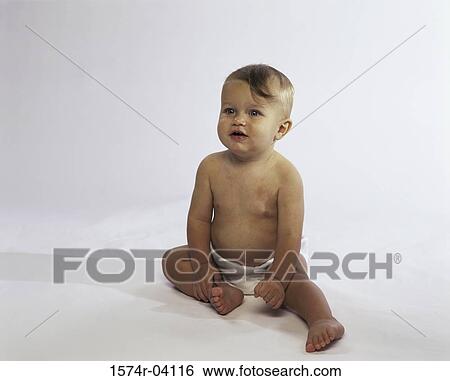 Baby boy sitting up in diapers View Large Photo Image Stock Photograph - Baby boy sitting up in diapers. Fotosearch