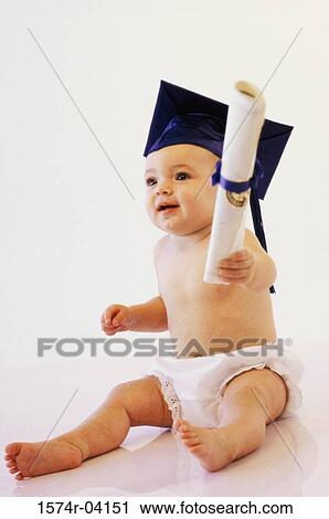 Baby boy wearing a mortar board holding a diploma View Large Photo Image Stock Image - Baby boy wearing a mortar board holding a diploma. Fotosearch