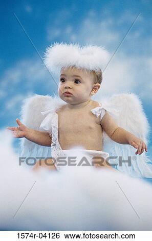 Baby girl dressed as an angel View Large Photo Image Stock Photograph - Baby girl dressed as an angel. Fotosearch