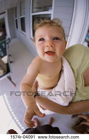 Close-up of a baby boy looking up View Large Photo Image Stock Image - Close-up of a baby boy looking up. Fotosearch