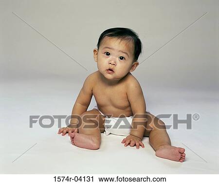 Portrait of a baby boy sitting View Large Photo Image Stock Image - Portrait of a baby boy sitting. Fotosearch