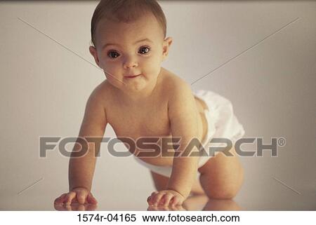 Portrait of a baby girl crawling on the floor View Large Photo Image Stock Photography - Portrait of a baby girl crawling on the floor. Fotosearch