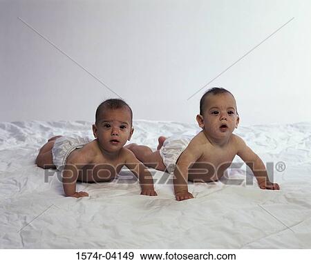Portrait of two baby boys wearing diapers View Large Photo Image Stock Photo - Portrait of two baby boys wearing diapers. Fotosearch