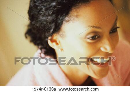 Close-up of a young woman View Large Photo Image Stock Image - Close-up of a young woman. Fotosearch