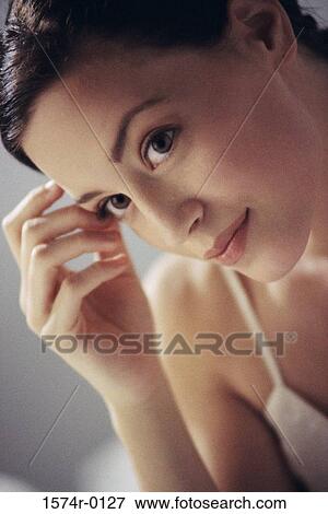 Close-up of a young woman View Large Photo Image Stock Photo - Close-up of a young woman. Fotosearch