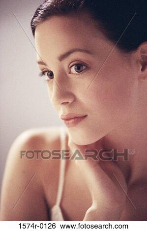 Stock Photograph - Close-up of a young woman. Fotosearch