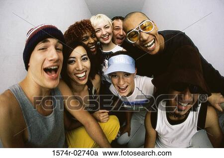 Close-up of a group of young people smiling View Large Photo Image Stock Image - Close-up of a group of young people smiling. Fotosearch