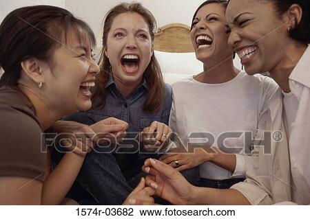Close-up of a group of young women laughing View Large Photo Image Stock Image - Close-up of a group of young women laughing. Fotosearch