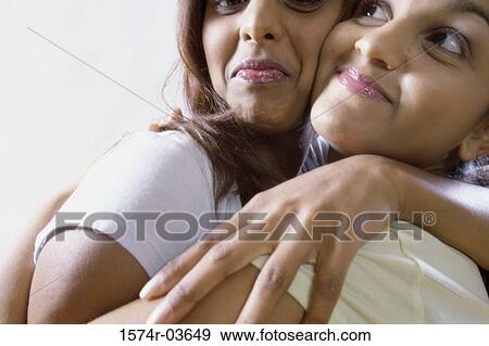 Close-up of two teenage girls smiling View Large Photo Image Stock Photo - Close-up of two teenage girls smiling. Fotosearch