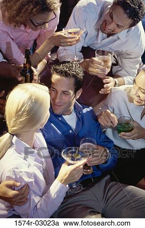 Group of young people in a bar View Large Photo Image Stock Image - Group of young people in a bar. Fotosearch