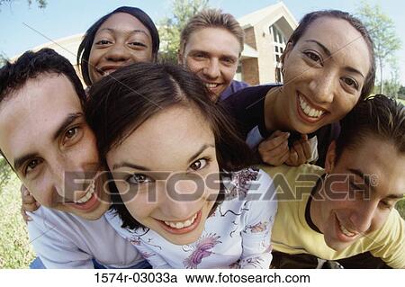 Portrait of a group of teenagers smiling View Large Photo Image Stock Image - Portrait of a group of teenagers smiling. Fotosearch
