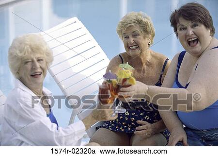 Portrait of three senior women toasting glasses of red wine View Large Photo Image Stock Image - Portrait of three senior women toasting glasses of red wine. Fotosearch