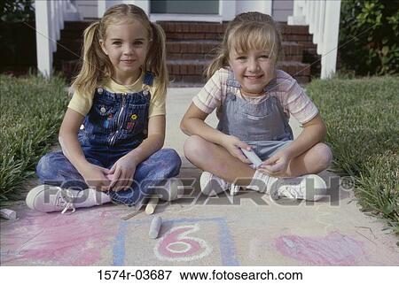 Portrait of two girls smiling View Large Photo Image Stock Photo - Portrait of two girls smiling. Fotosearch