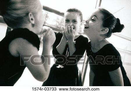 Three ballerinas laughing View Large Photo Image Stock Image - Three ballerinas laughing. Fotosearch