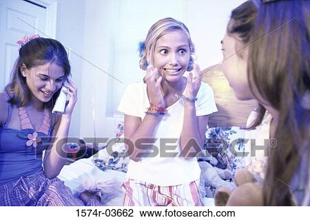 Three teenage girls at a slumber party View Large Photo Image Stock Image - Three teenage girls at a slumber party. Fotosearch