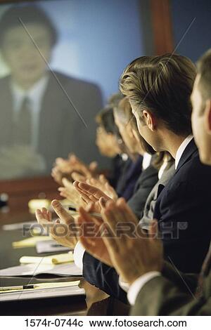 Business executives applauding in a meeting View Large Photo Image Stock Image - Business executives applauding in a meeting. Fotosearch