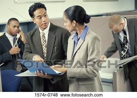 Business executives in a discussion View Large Photo Image Stock Photo - Business executives in a discussion. Fotosearch